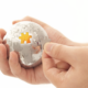 A close-up of hands assembling a spherical jigsaw puzzle, symbolizing the integration and completeness provided by IT solutions in Dallas. The image represents the seamless fit and strategic alignment that effective IT solutions bring to businesses in Dallas.